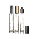 Flacon vaporisateur en verre transparent pour parfum, rechargeable et portable, idéal pour les voyages.